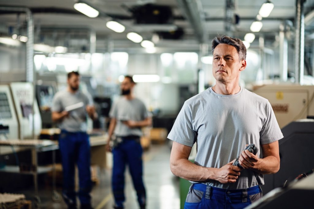 Industrial facility engineer at production line.