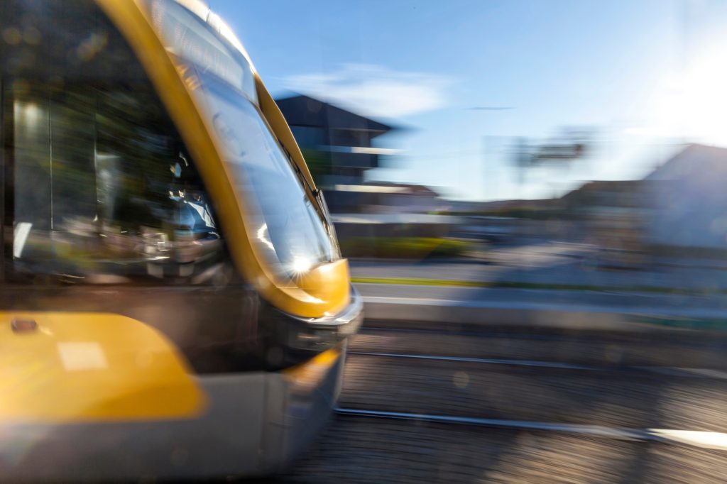 Traveling by train, modern metro running from one station to another in Porto, Portugal